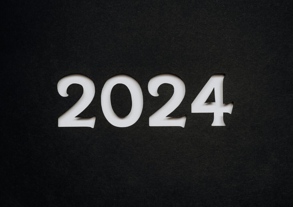 Close-up of the year 2024 on a black background, representing future trends in cryptocurrency