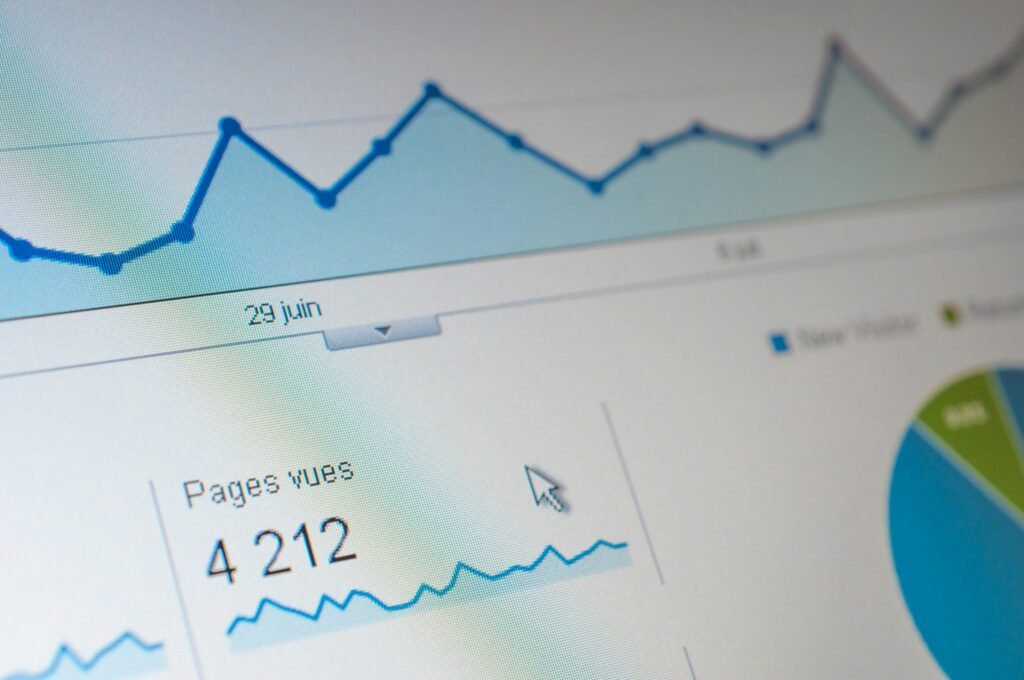 Close-up of a digital analytics dashboard showing page views and visitor trends