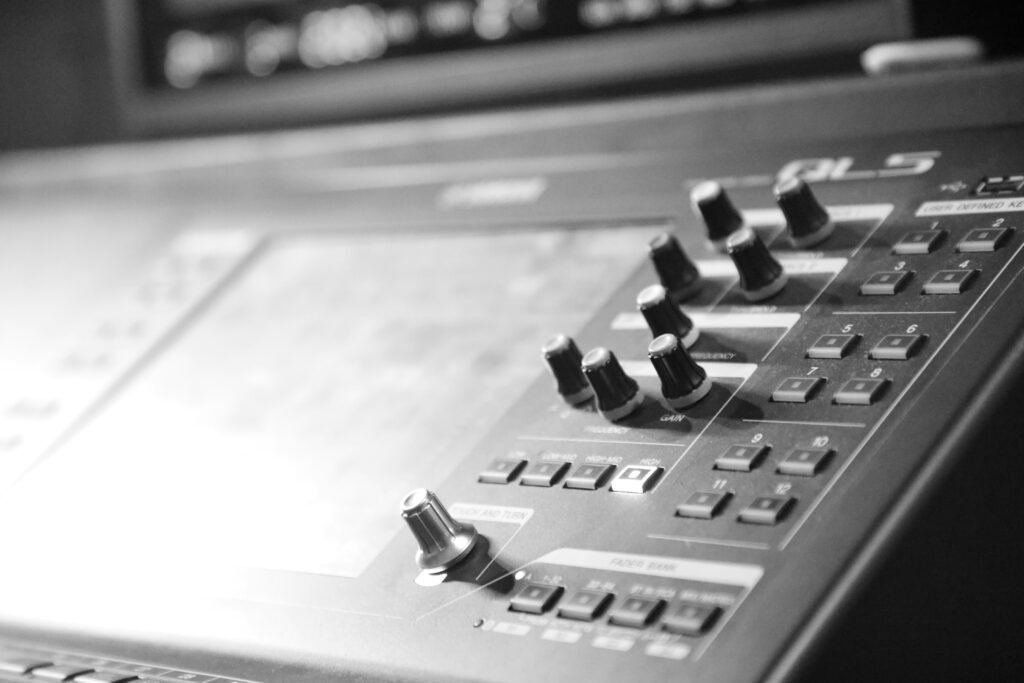 Close-up of a control board with knobs and buttons, representing tech equipment on a crypto news blog