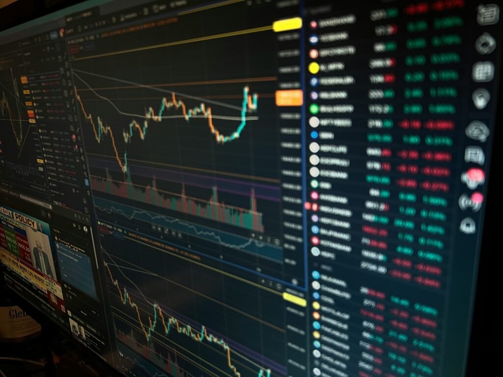 Cryptocurrency charts and data analysis on a computer screen