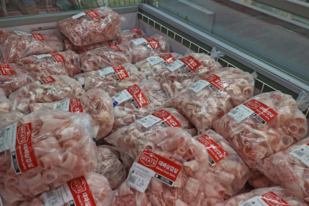 Packaged pork bones in a supermarket freezer