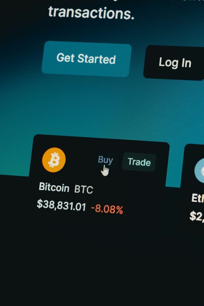 Cryptocurrency trading interface displaying Bitcoin price drop with buy and trade options.