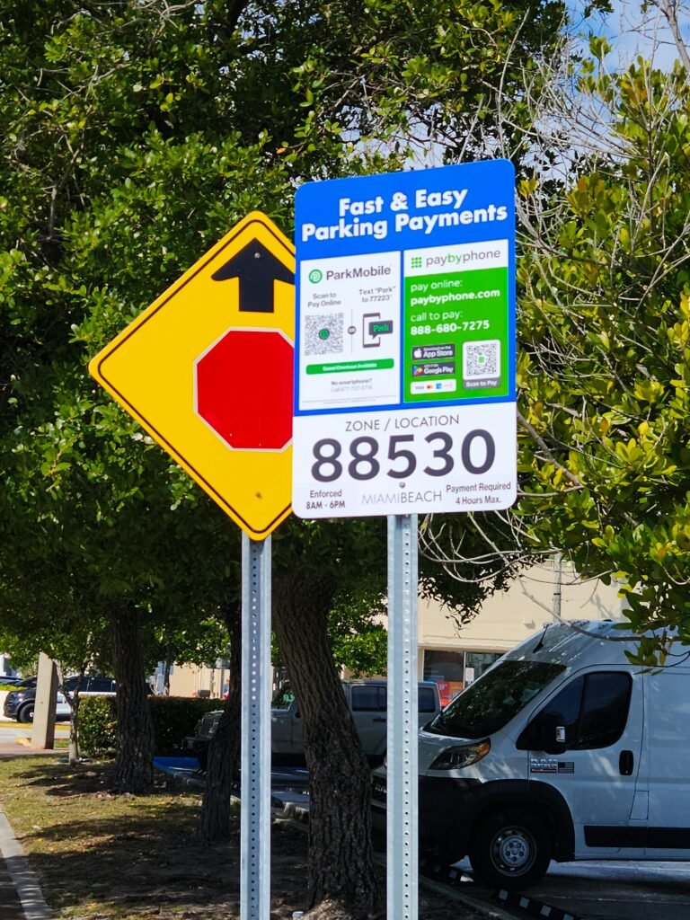 Parking payment sign with options for online and mobile payment in Miami Beach