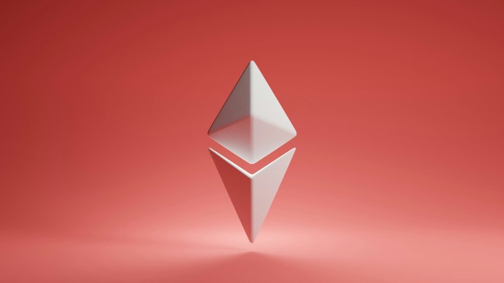 Stylized Ethereum logo on a red background