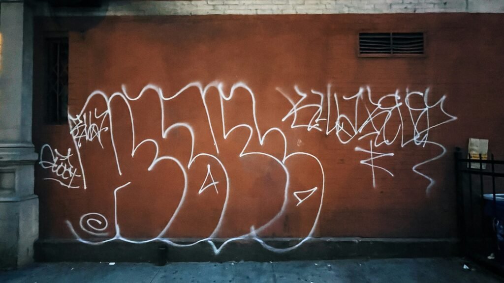 Street art graffiti on a brick wall